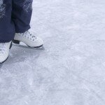 Low section view of a person wearing ice skates